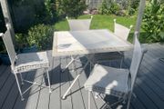 Wrought iron table and 4x chairs