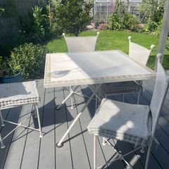 Wrought iron table and 4x chairs