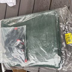 Large tarp with string and clips