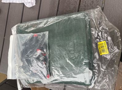 Large tarp with string and clips