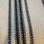 2 metres of 100% cotton canvas treble ticking stripe fabric in oatmeal and vintage black Image 3
