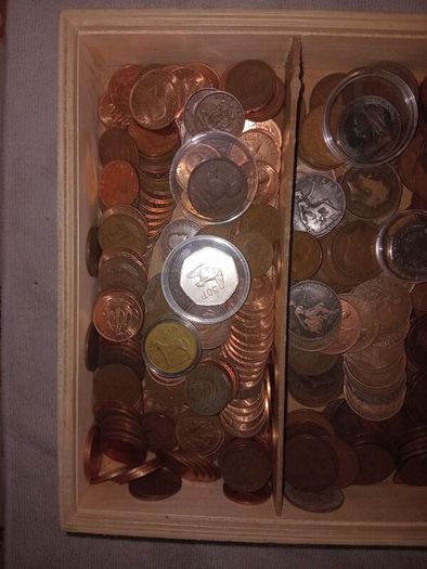 4 kg.coins+14 banknotes.