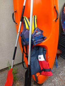 Kayak plus 2 paddles and 2 bouyancy aides