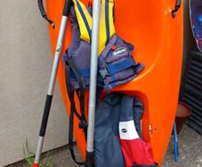 Kayak plus 2 paddles and 2 bouyancy aides