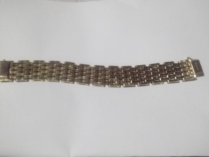 a heavy gold plated gate bracelet
