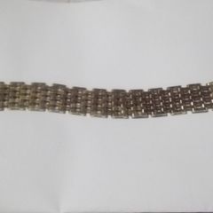 a heavy gold plated gate bracelet