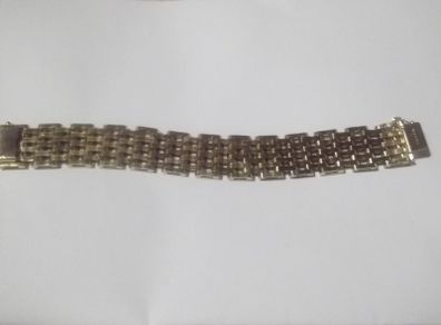 a heavy gold plated gate bracelet