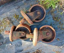 Vintage Flexello Cast Iron Industrial Casters (Set of 3)