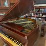 a circa-1931 Monington & Weston baby grand with matching stool. Image 5