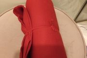 Red throw with scalloped edges
