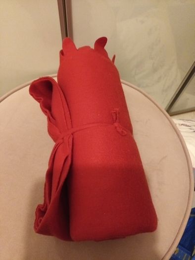 Red throw with scalloped edges