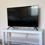 TV with Roku and Console Table Image 6