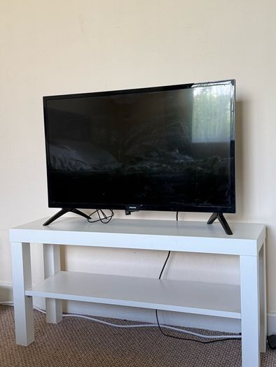 TV with Roku and Console Table