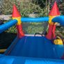 Happy Hop Bouncy Castle with Slide Image 2