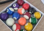 pool balls, triangle and chalk