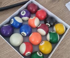 pool balls, triangle and chalk