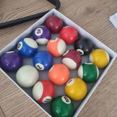 pool balls, triangle and chalk