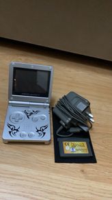 Retro Nintendo Game Boy Advance SP  "Tribal Limited Edition" comes with "Rayman Hoodlums revenge" game