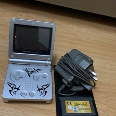 Retro Nintendo Game Boy Advance SP  "Tribal Limited Edition" comes with "Rayman Hoodlums revenge" game
