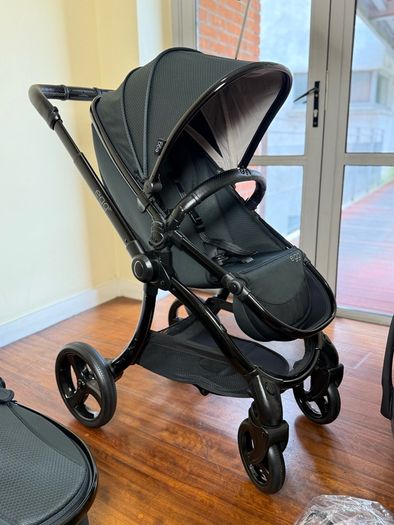 As New Egg2 travel system with Cybex car seat and isofix base swivel