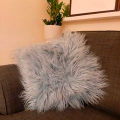 Retro 70s style shaggy turquoise blue throw pillow
