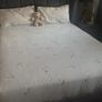 Reduced kingsize bed frame with matching curtains and leather armchair Image 9