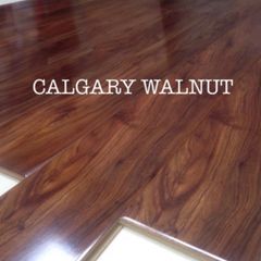 New 12mm Calgary Walnut High Gloss Laminated