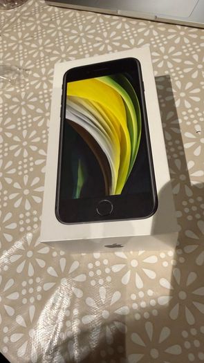iPhone SE 2 with box and earphones