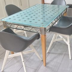 Italian glass table and 4 chairs (can sell seperately)