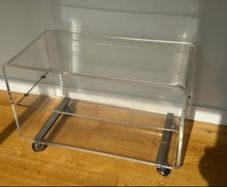 Vintage Clear Lucite/Acrylic Tv Stand/Shelf Unit on Chrome Casters.