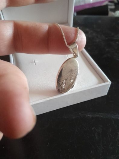 silver chain and locket