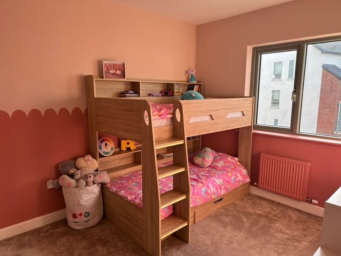 Bunk bed with shelves and drawer