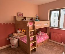 Bunk bed with shelves and drawer