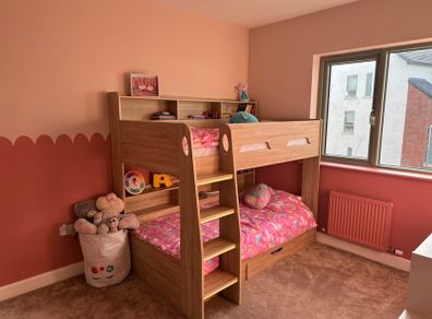 Bunk bed with shelves and drawer