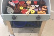 wooden bbq with food