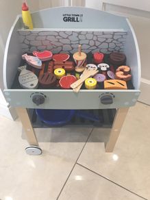 wooden bbq with food