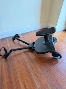 Universal buggy board with seat