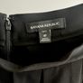 Banana Republic pleated flare faux leather hem skirt with pockets Size 4 petite/ S/ UK 10 Black Image 2