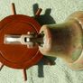 Vintage Wooden Ship Wheel with Brass Bell Image 3