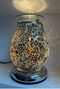 Electric lamp wax melter