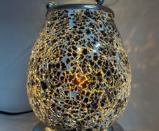Electric lamp wax melter