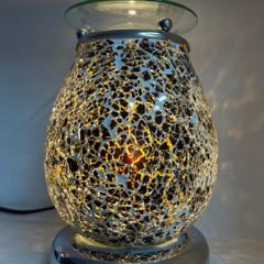 Electric lamp wax melter