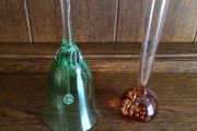 Green glass bell and a coral bubble glass bud vase