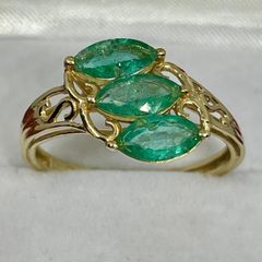 Silver ring with emeralds