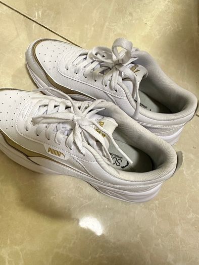 Puma white trainers
