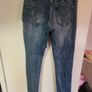 distressed denim jeans Image 5