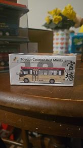 toyota coaster red minibus