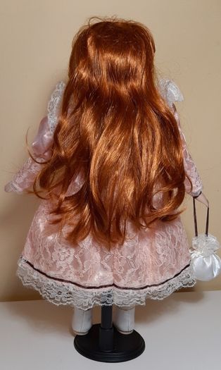9 x  Porcelain dolls