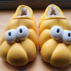 Child's plush lined yellow funny eyes slippers