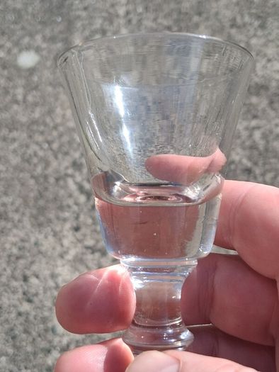A Set of Cumbria Ware Hand Blown Toasting Glasses